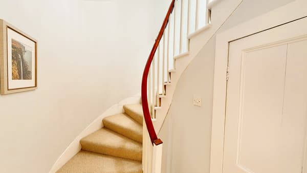 Stairs leading to the attic floor