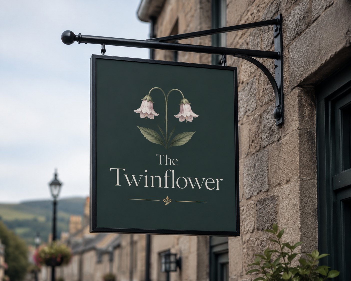 The Twinflower hanging sign on a Grantown-on-Spey street